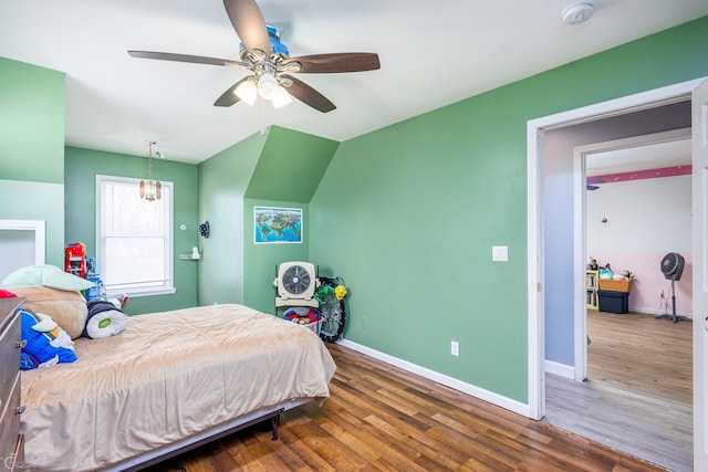 bedroom with wood-type flooring and ceiling fan