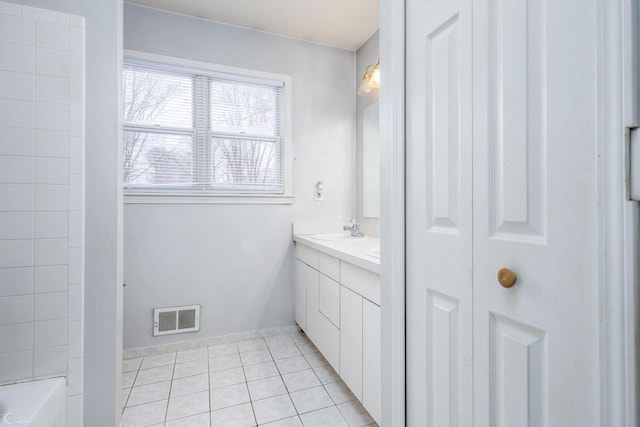 bathroom featuring vanity and tile patterned floors