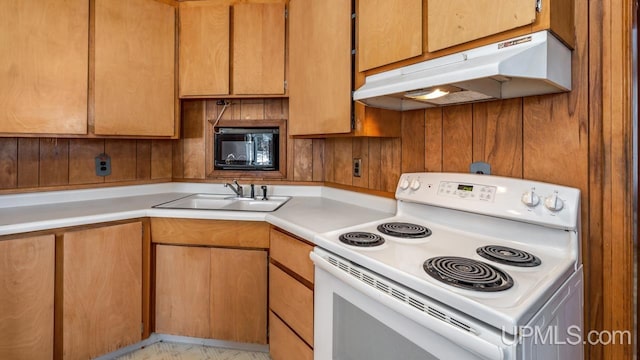 kitchen featuring sink and white electric range