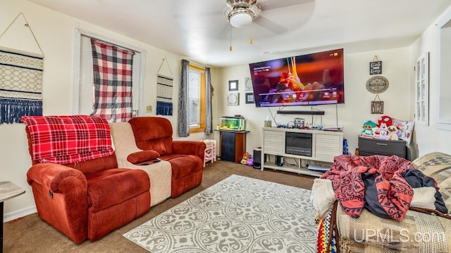 living room featuring carpet flooring and ceiling fan