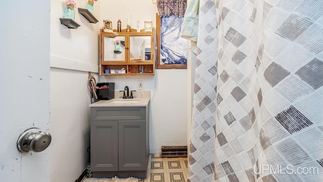 bathroom with vanity and walk in shower