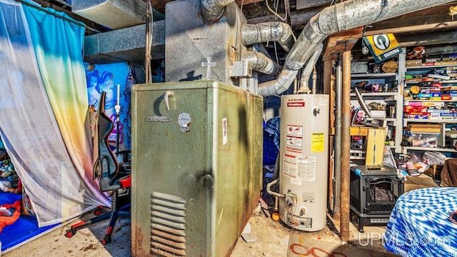 utility room featuring water heater