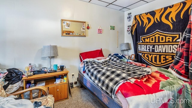 bedroom with a drop ceiling