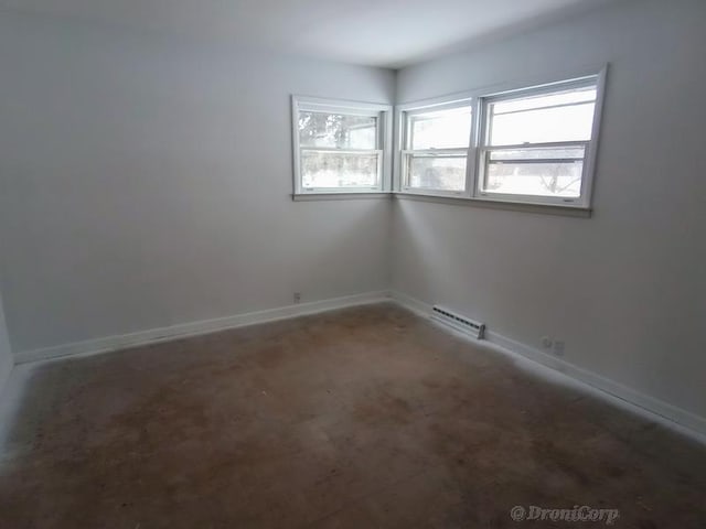 empty room with baseboard heating