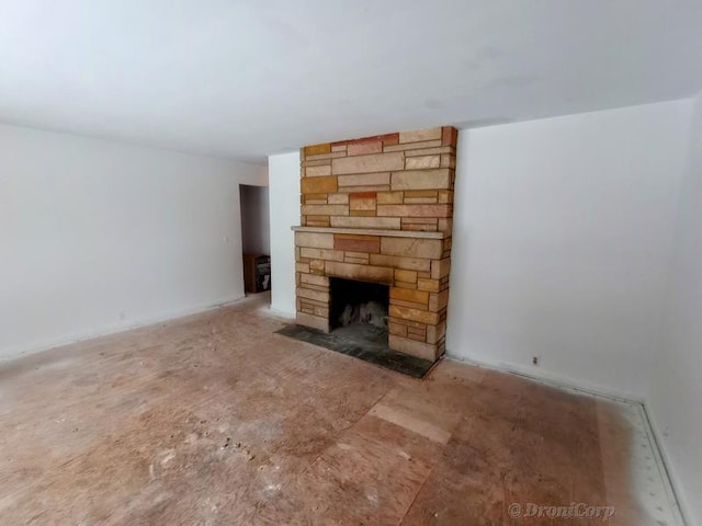 unfurnished living room with a fireplace