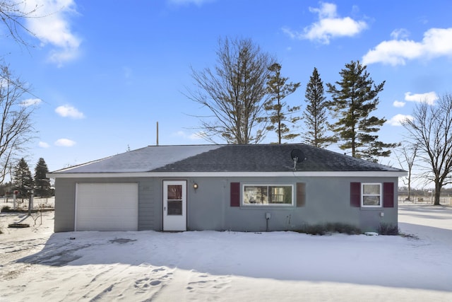 single story home with a garage