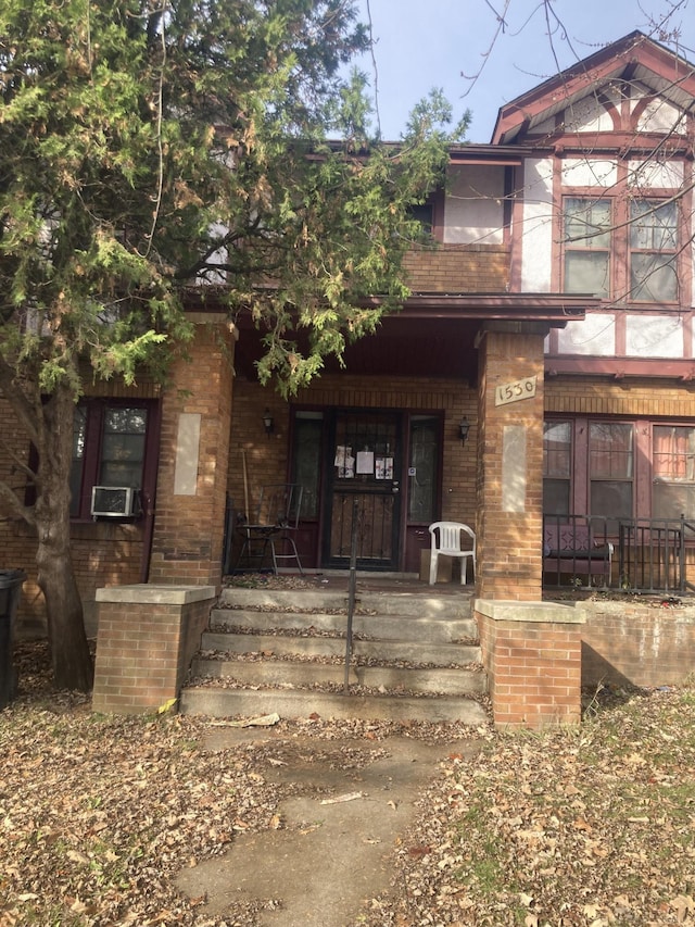 doorway to property featuring covered porch