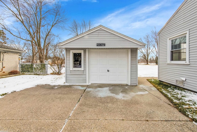 view of snow covered garage