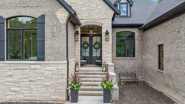 entrance to property featuring french doors