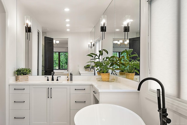 bathroom featuring a bathtub and vanity