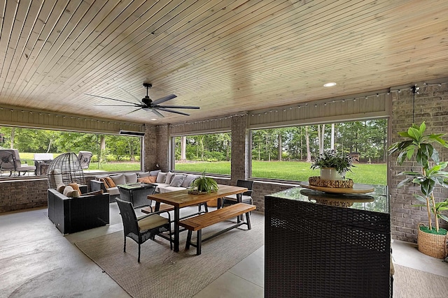 view of patio / terrace with an outdoor living space and ceiling fan