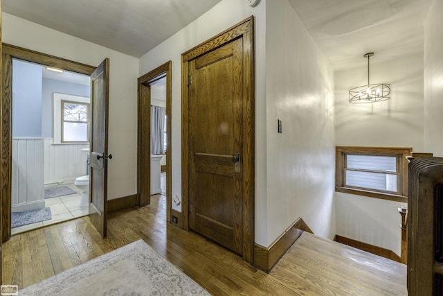 hallway featuring light hardwood / wood-style flooring