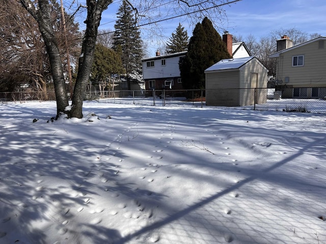 view of yard covered in snow