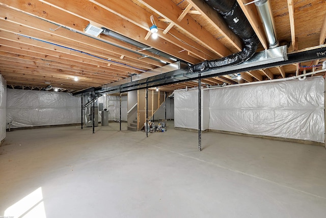 basement featuring heating unit