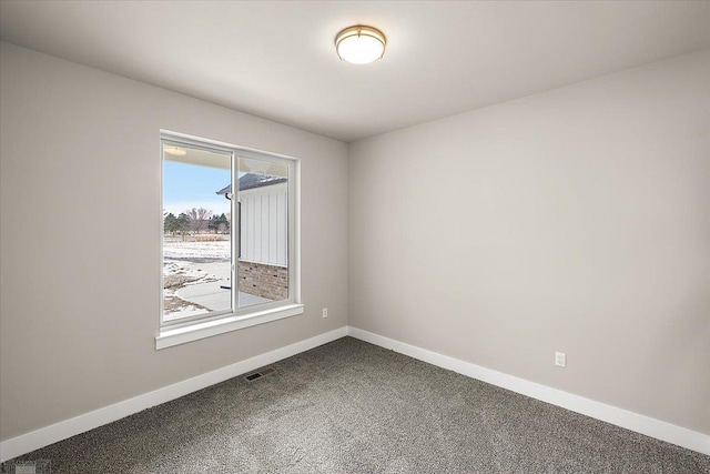 empty room with carpet floors