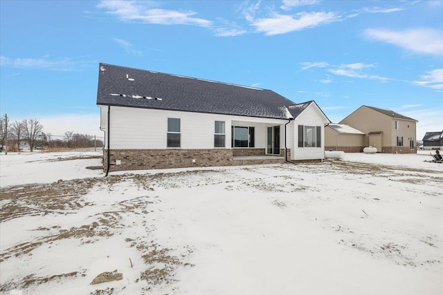 view of snow covered property