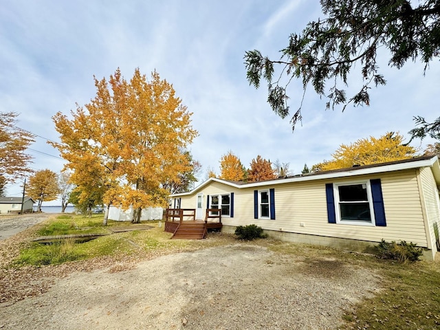 exterior space featuring a wooden deck