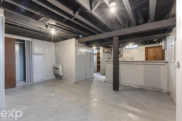 basement with heating unit