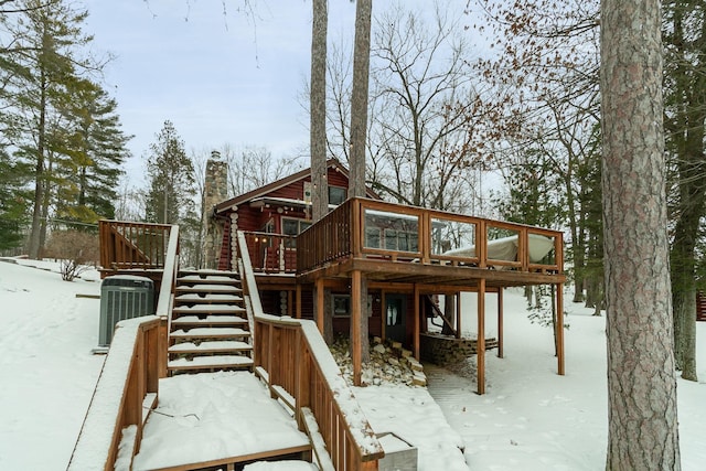 exterior space featuring a deck and central air condition unit