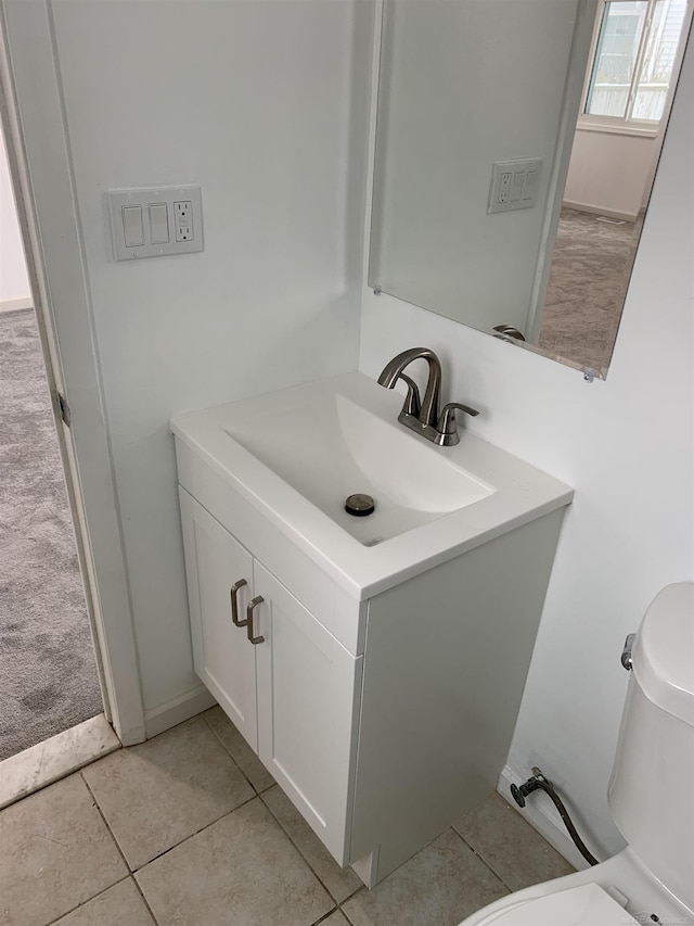 bathroom with vanity and tile patterned flooring