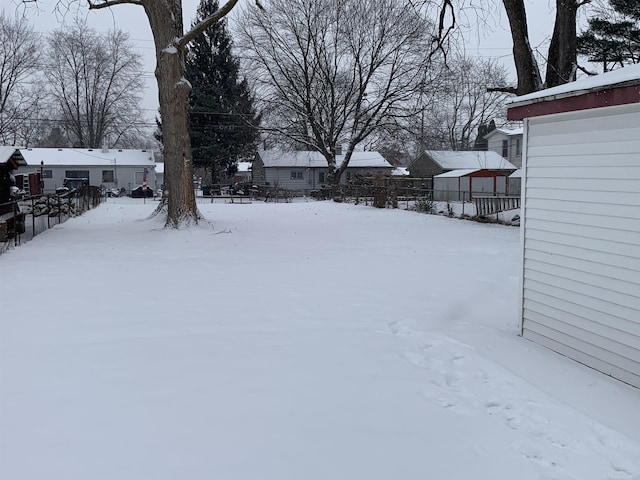 view of yard covered in snow