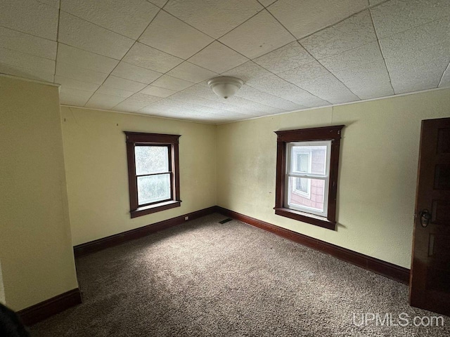 spare room with carpet