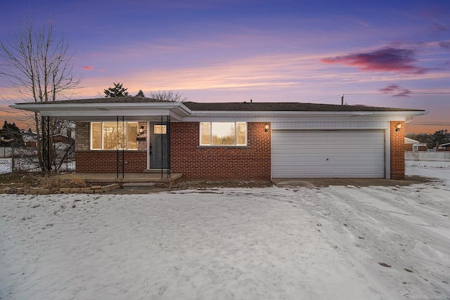 single story home featuring a garage