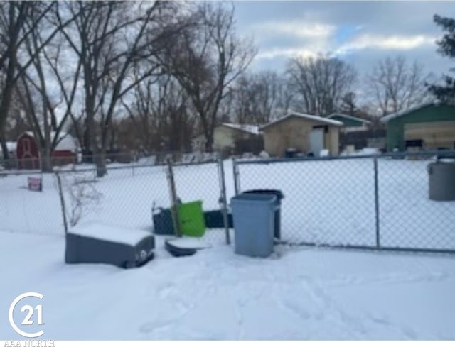 view of yard layered in snow