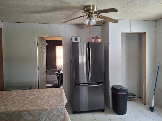 kitchen with ceiling fan and stainless steel fridge