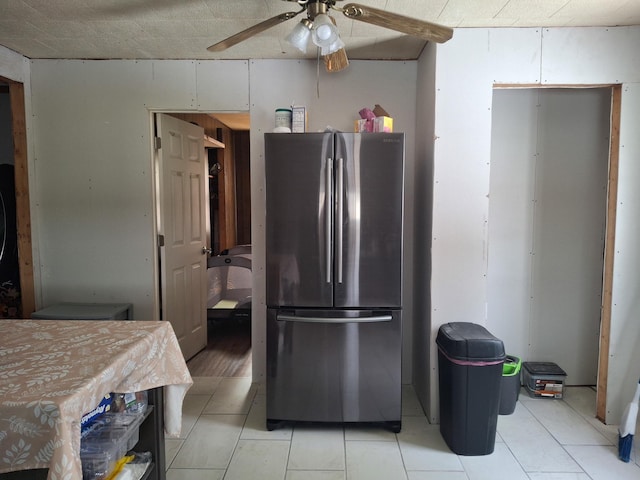 kitchen featuring stainless steel fridge and ceiling fan