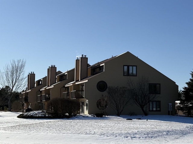 view of snow covered property