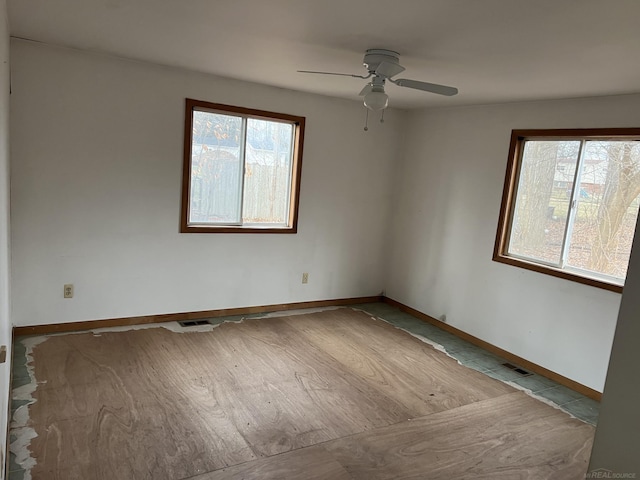 empty room featuring ceiling fan