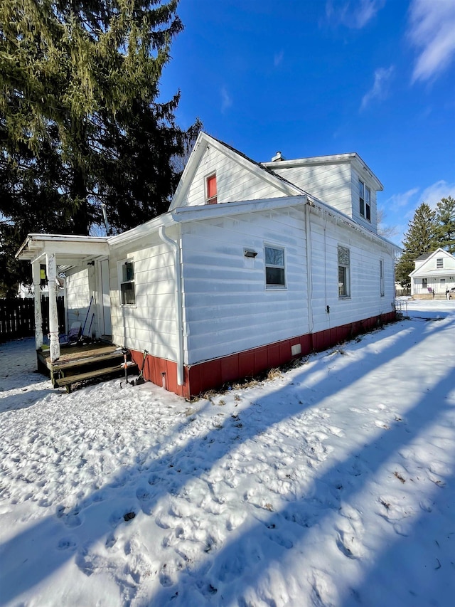 view of snow covered property