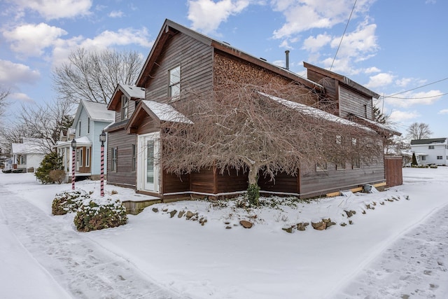 view of snow covered property