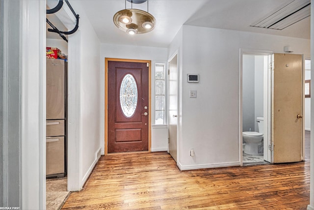 foyer entrance featuring light wood-type flooring