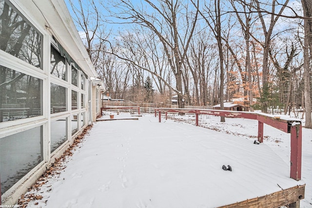 view of yard covered in snow