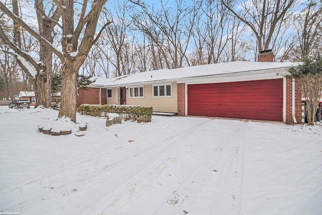 ranch-style home with a garage