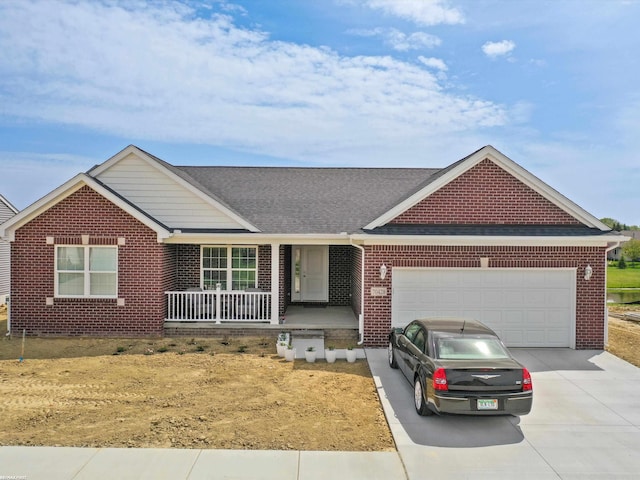 single story home featuring a garage and covered porch