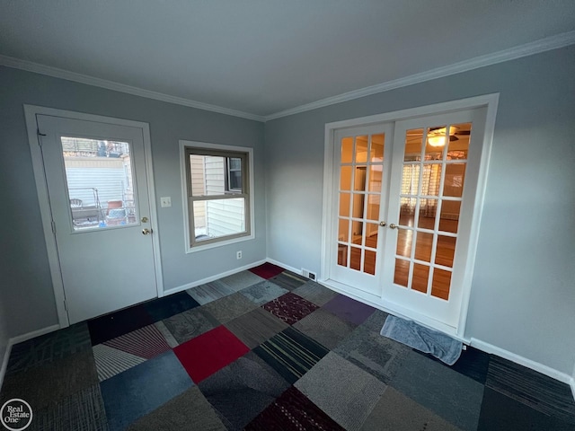 doorway to outside featuring dark colored carpet, ornamental molding, and french doors