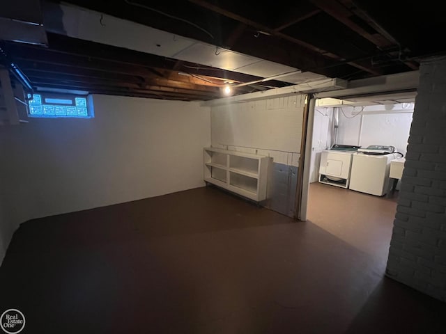 basement featuring washer and clothes dryer