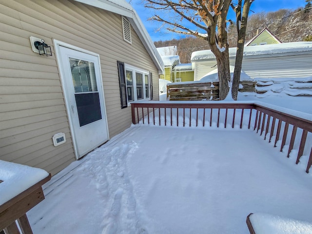 view of snow covered deck