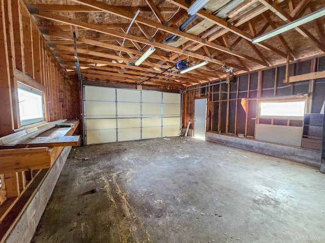 garage featuring a garage door opener