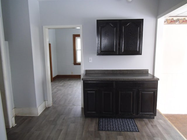 hallway featuring dark hardwood / wood-style floors