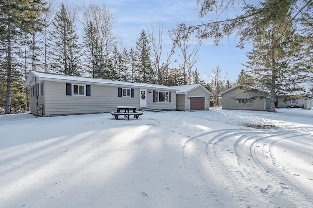 single story home featuring a garage