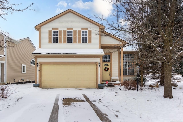 view of front of home with a garage