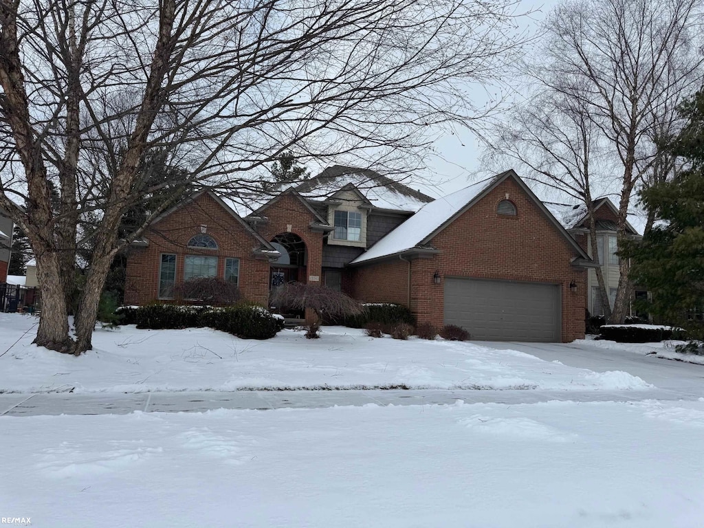 view of front of property featuring a garage