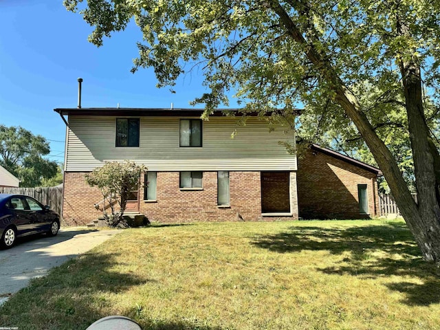 view of front of property with a front lawn