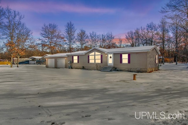 view of front of home featuring a garage