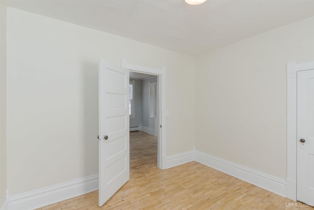 empty room featuring light hardwood / wood-style floors