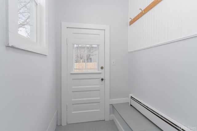 entryway with a baseboard radiator